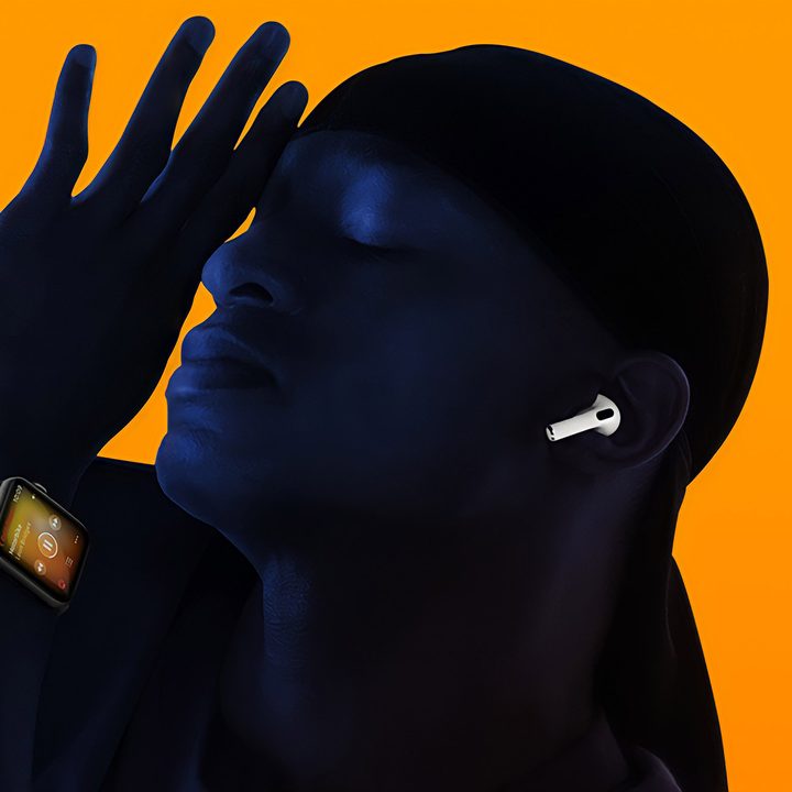 Man wearing the new Airpods Gen 3 featuring adaptive eq.