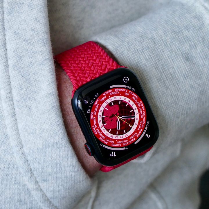 Apple Watch Series 7 on a wrist with hand tucked in to a sweatshirt pocket.