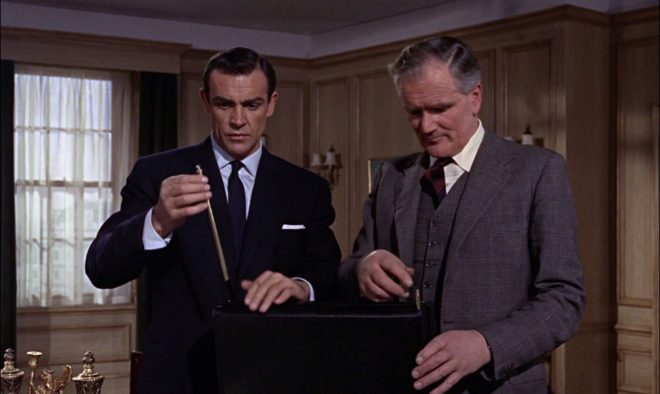 James Bond checks out his trick briefcase in From Russia With Love.