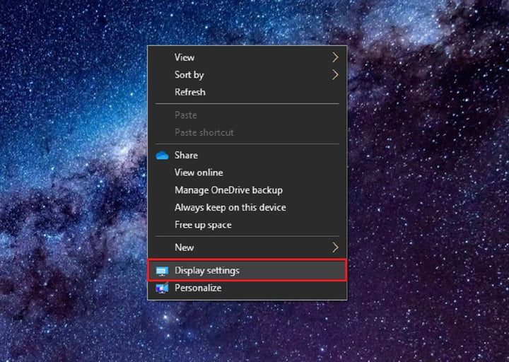 Windows 10 desktop menu screenshot showing how to navigate to Display Settings.