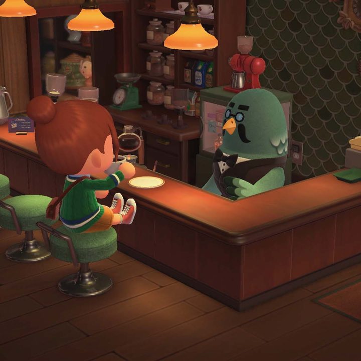 A Villager drinks coffee at The Roost in Animal Crossing: New Horizons.
