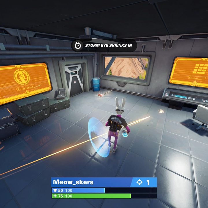 Shooting a player in Fortnite.