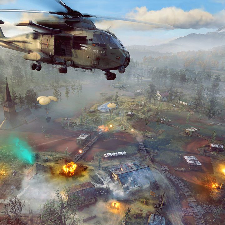 A helicopter flies over a hectic battlefield in Ghost Recon Frontline.