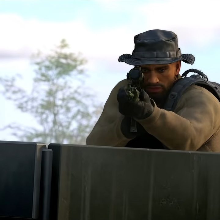 A sniper lines up a shot in Ghost Recon Frontline.