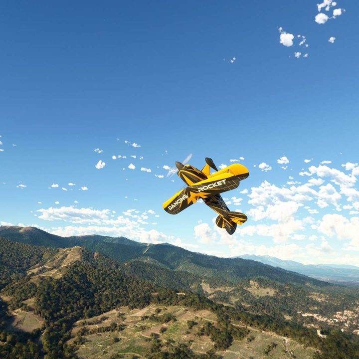 A plane turns upside down in Microsoft Flight Simulator.