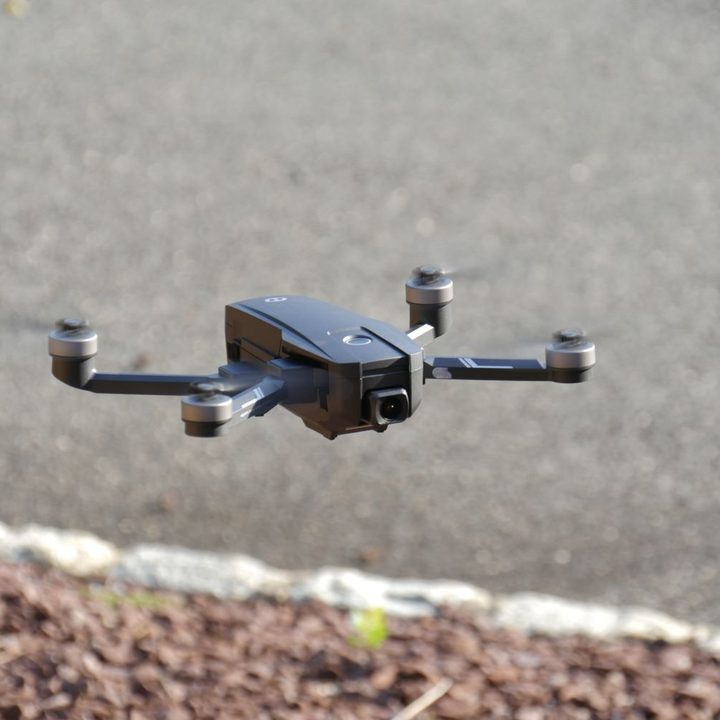 Holy Stone HS720E drone hovering in air.