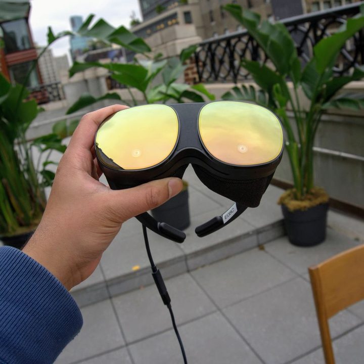 HTC Vive Flow reflective goggles.