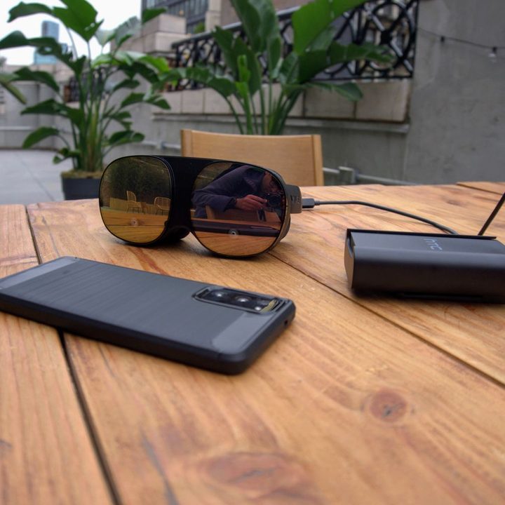 HTC Vive Flow with phone and battery.