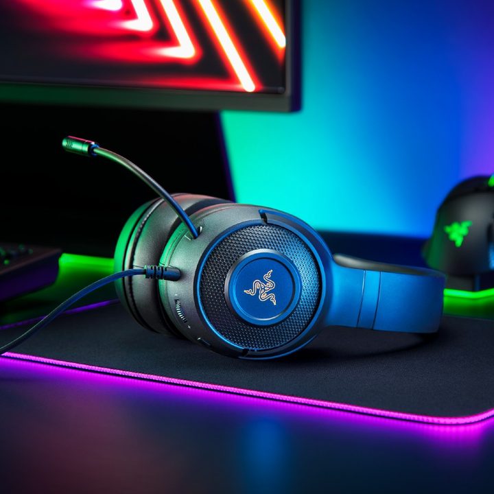 The Kraken V3 gaming headset on a black table.