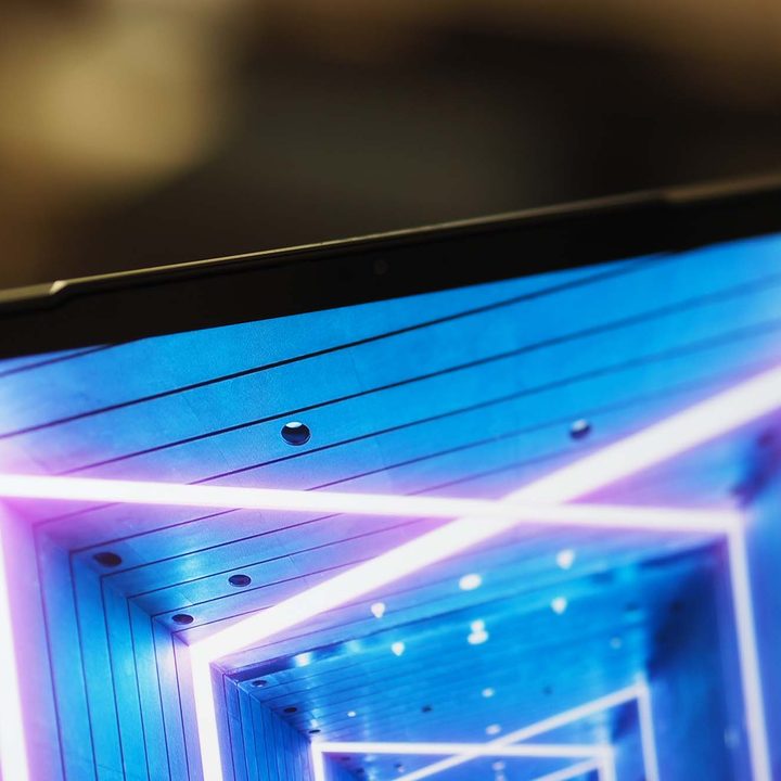 Closeup image on the webcam, screen, and bezels on the Lenovo IdeaPad Slim 7i Pro.