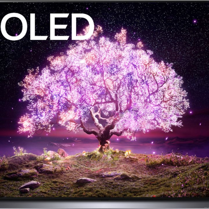 LG 65inch OLED 4K TV with glowing purple tree on the screen, on a white background.