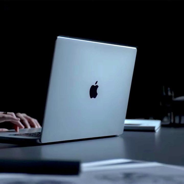Lifestyle image of someone using the new Macbook Pro 2021.