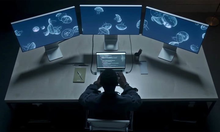 Lifestyle image of someone using the new Macbook Pro 2021.
