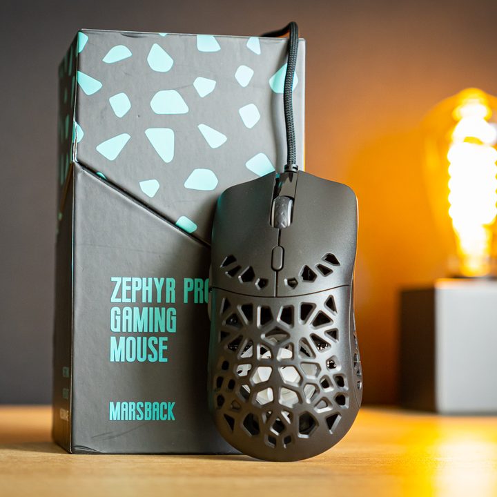 The Marsback Zephyr Pro's next to its box.