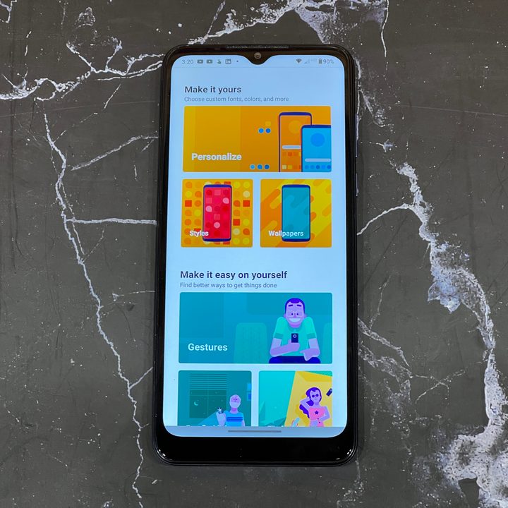 Tiled screen on the Moto G Pure showing customization options.