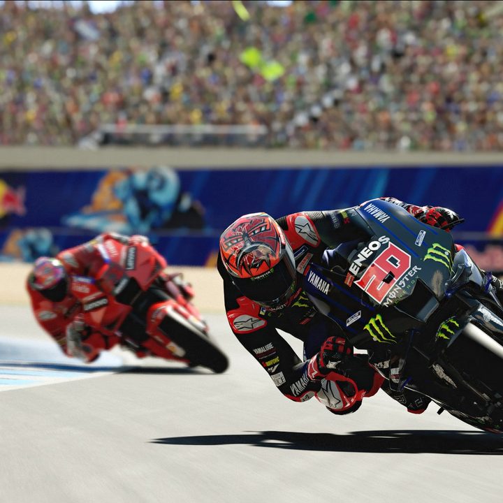 MotoGP racer leaning into turn.