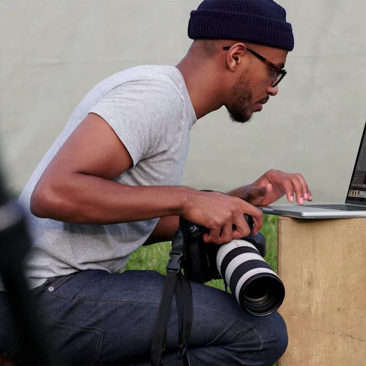 Photographer using the new Macbook Pro.