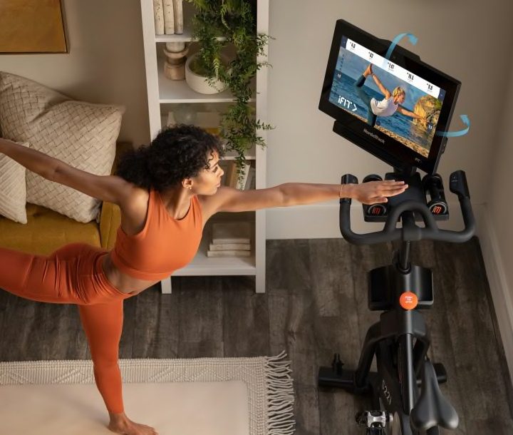 NordicTrack S22i outdoors workout on the screen.