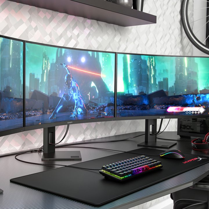 Three Omen 27C monitors side by side.