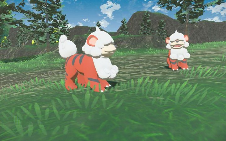 A pair of Hisuian Growlithes in Pokémon Legends: Arceus.
