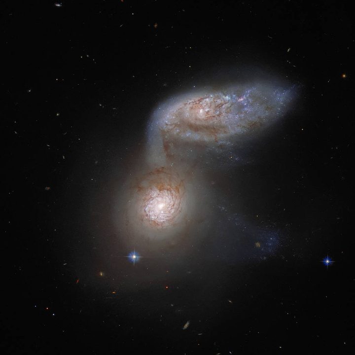 Two interacting galaxies that are so intertwined, they have a collective name – Arp 91.