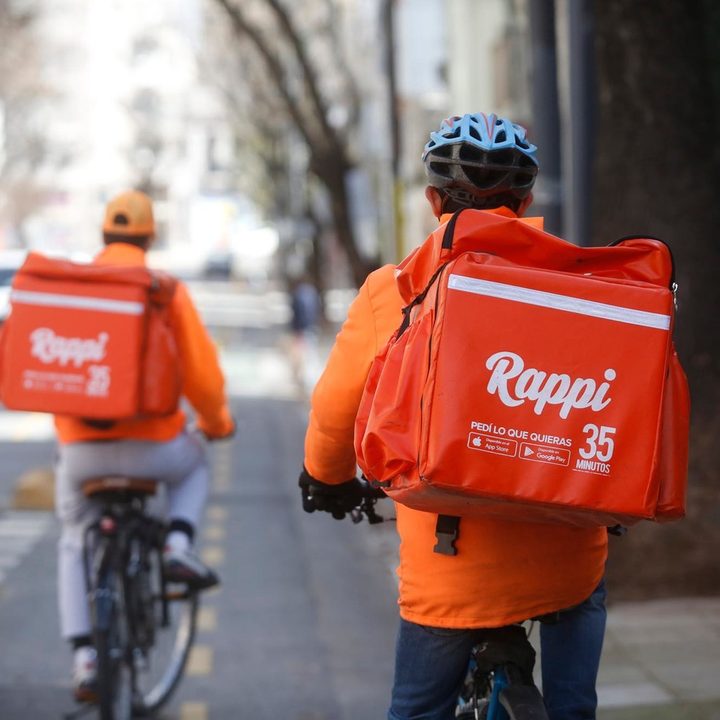 Rappi delivery workers on bikes.