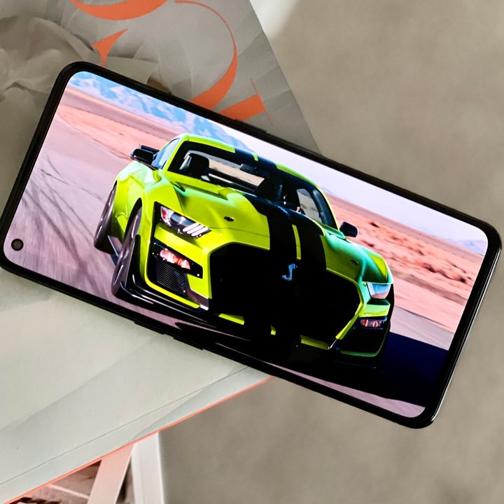 Realme GT Neo2 showing car on screen.