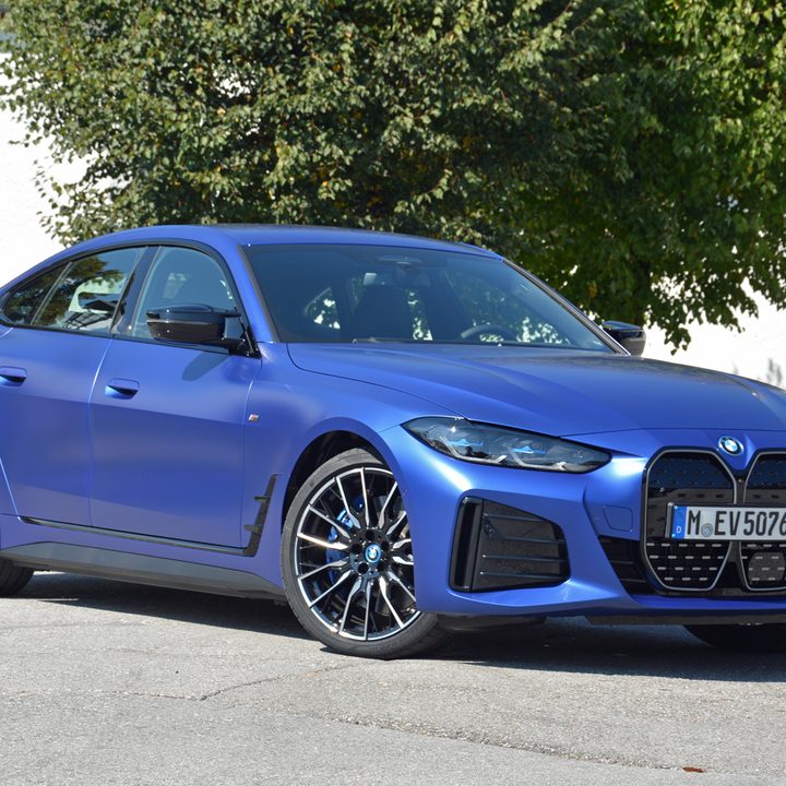 A 2022 BMW i4 M50 in a driveway.
