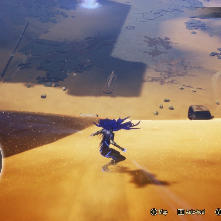 Shin Megami Tensei 5's protagonist sliding down a hill of sand.
