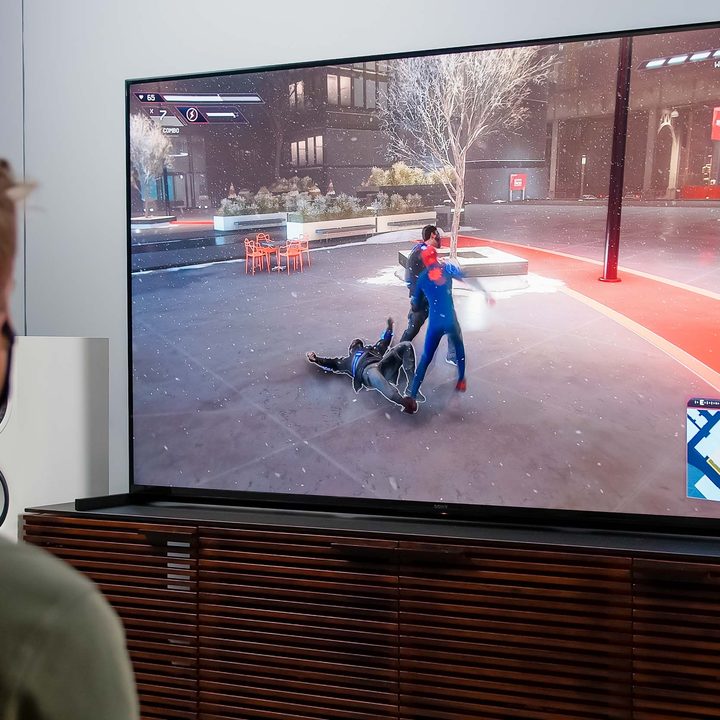 Caleb Denison playing a video game on the Sony Z9J.