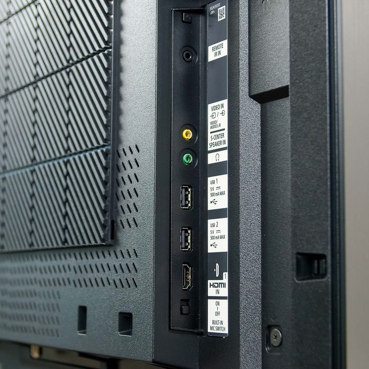 A view of the backside of the Sony Bravia Z9J, showing off USB ports, an HDMI plugin, and other plugins/ports.