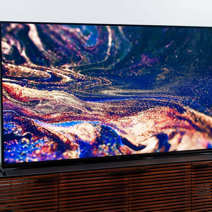 Sony Z9J TV with an image of multicolor, glittery swirls on screen.