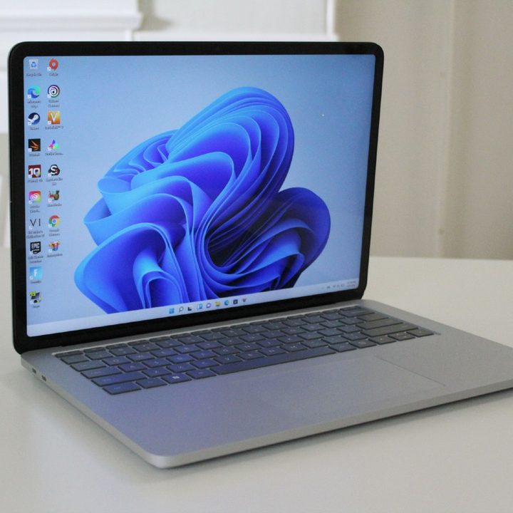 The Surface Laptop Studio on a white table.