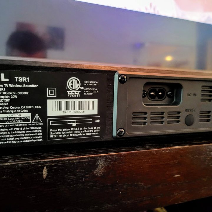 The rear and ports of a TCL Roku TV Alto R1 Wireless Soundbar.