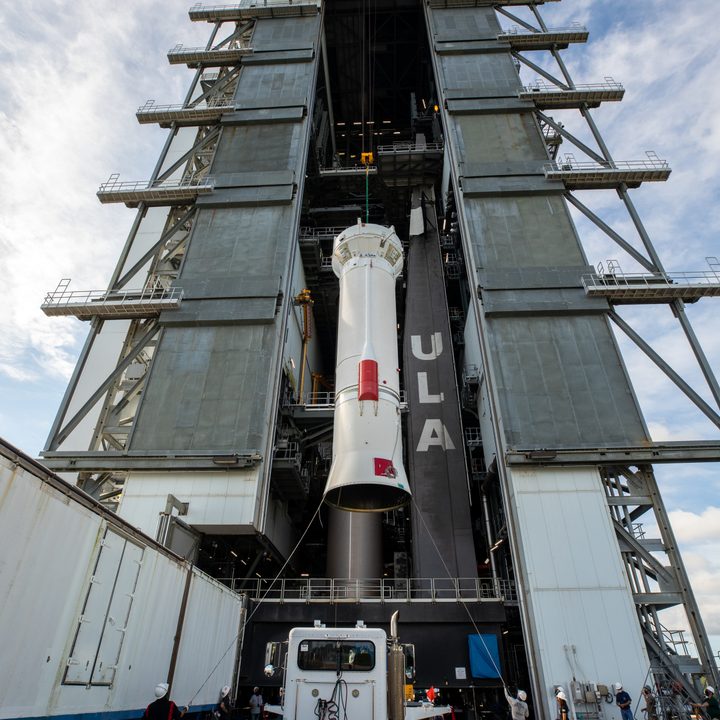 The (ULA) Centaur stage for NASA’s Lucy mission is lifted by crane into the Vertical Integration Facility.