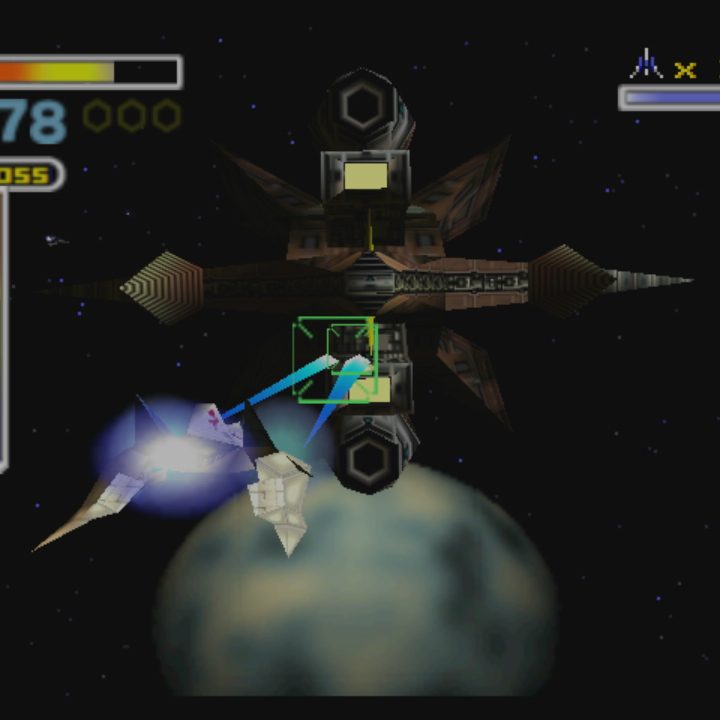 An Arwing fires at an enemy in StarFox 64.