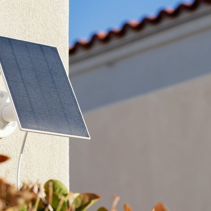 A solar panel on the outside of a building.