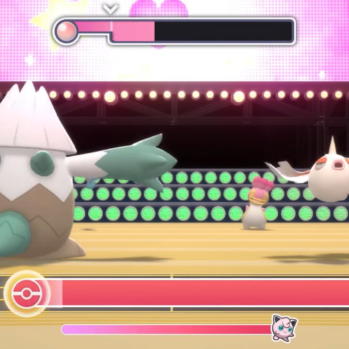 Pokemon dancing on a stage.
