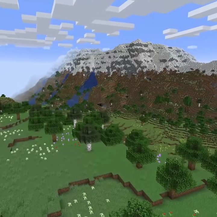 A mountain with a snowcapped peak.