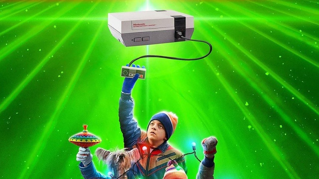 Winslow Fegley reaches for a Nintendo in a promotional image for 8-Bit Christmas.