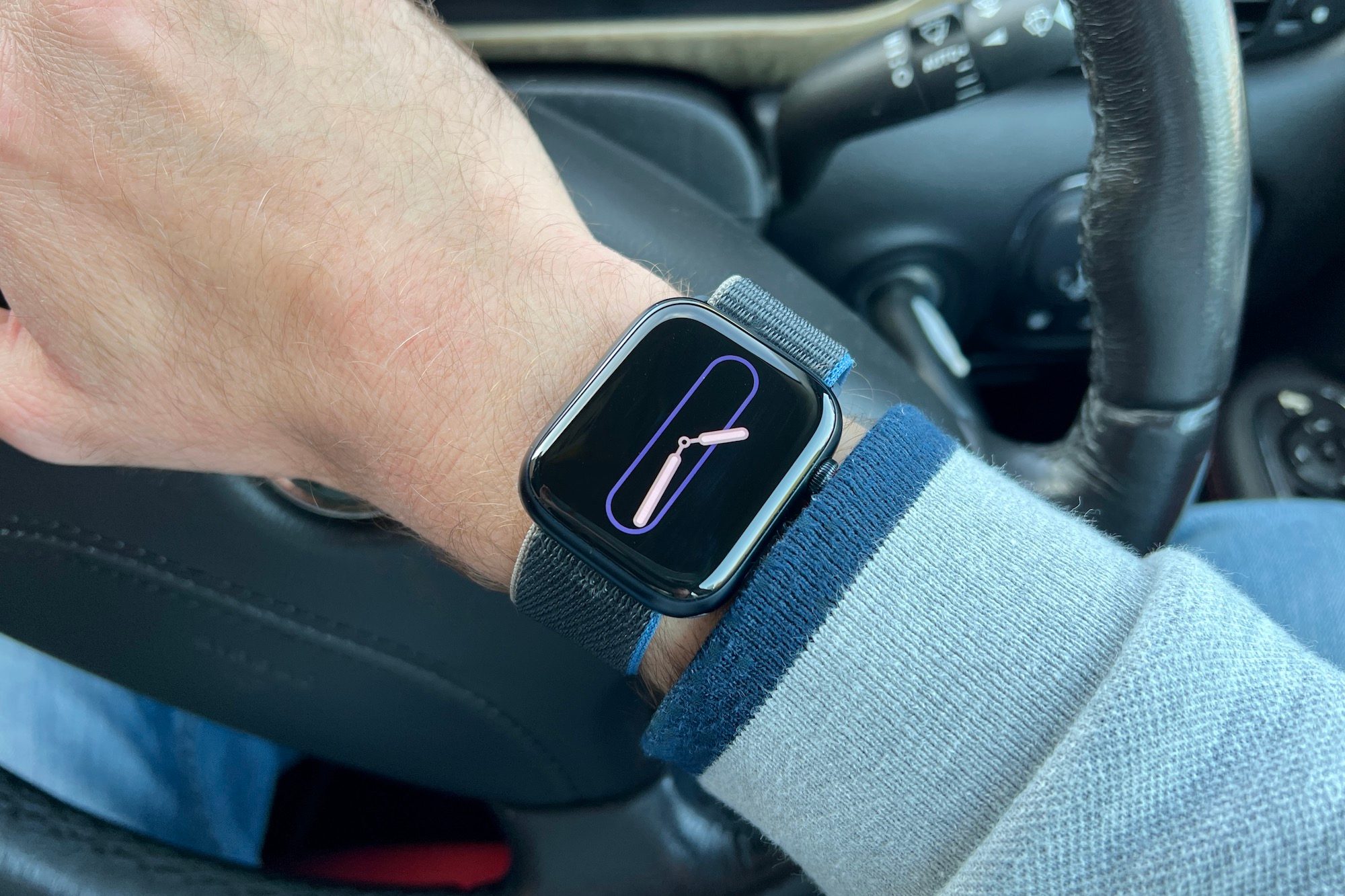 Apple Watch on the right wrist.