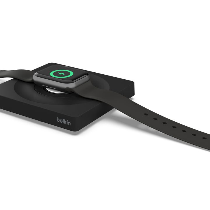 Image of the Boost Charge Pro Portable Fast Charger with an Apple Watch.