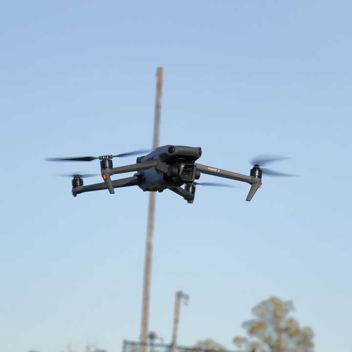DJI Mavic 3 hovering in the air.