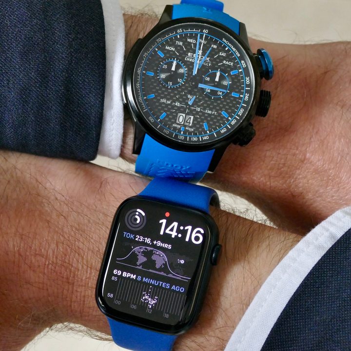 Edox watch and Apple Watch.
