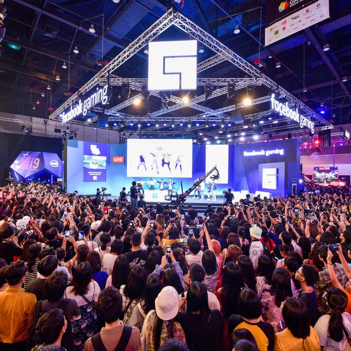 A crowd gathers at a Facebook Gaming event.