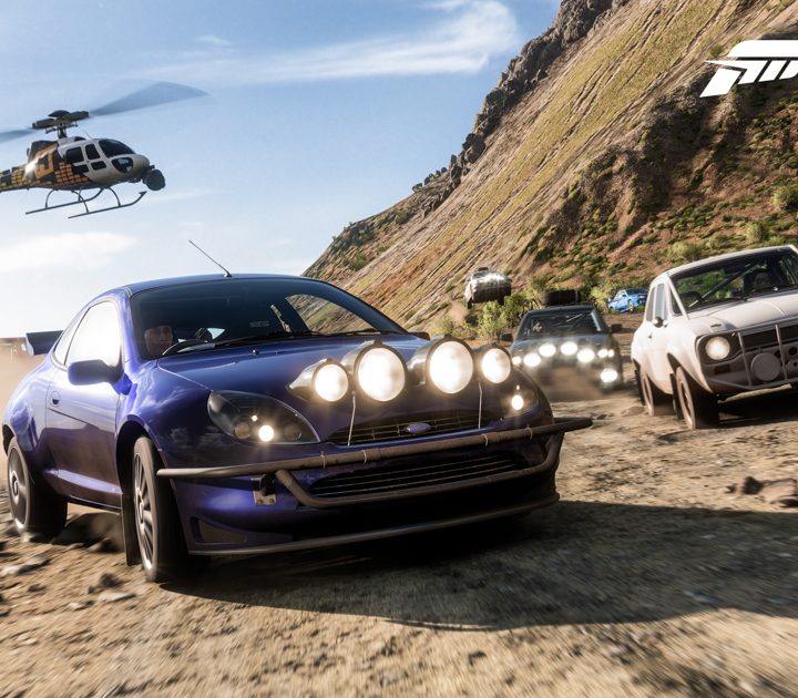 Forza Horizon 5 cars racing on dirt road.