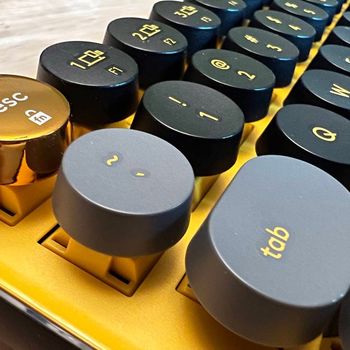 The gold escape button.