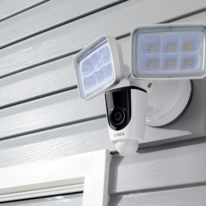 Lorex 1080P WiFi Floodlight Camera installed above garage.