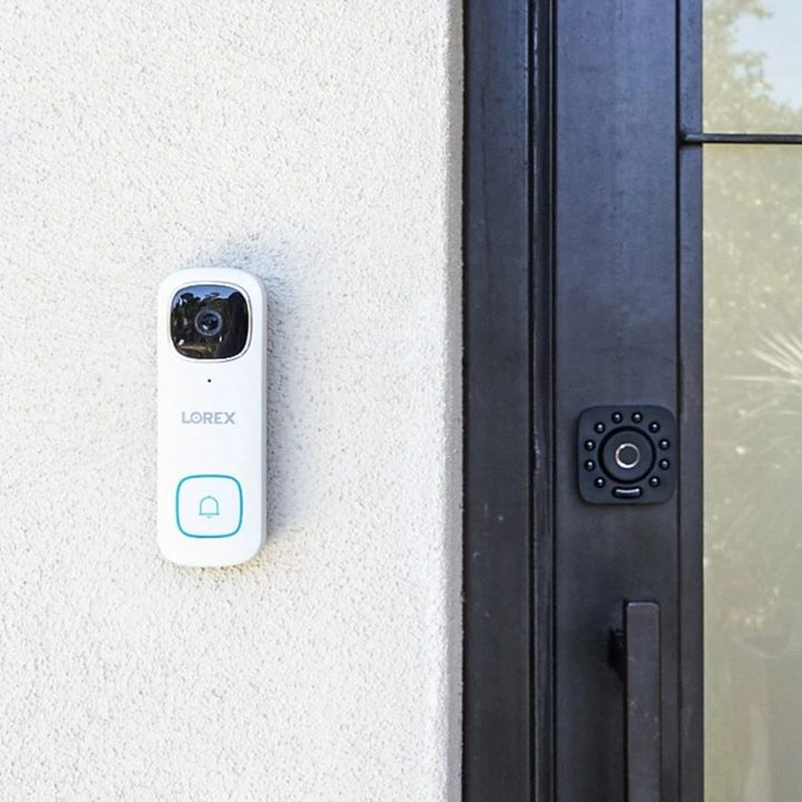 Lorex 2K WiFi Video Doorbell with Person Detection Wired installed on wall.