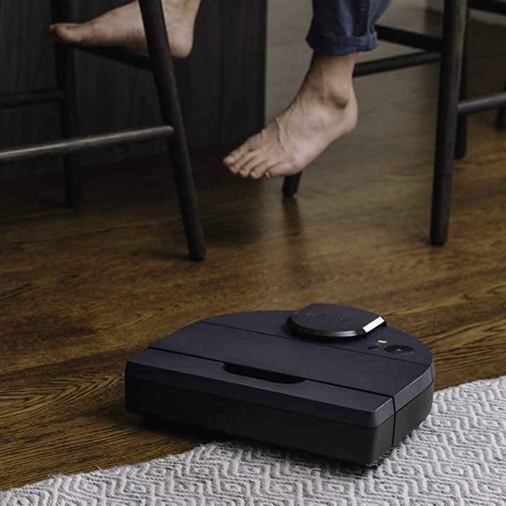 The Neato Botvac D8 cleaning carpeting.
